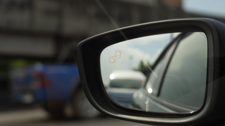 a crash avoidance indicator in mirror