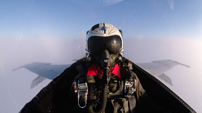 Pilot Bobby Rahal flies an F-18 Navy fighter jet over eastern California
