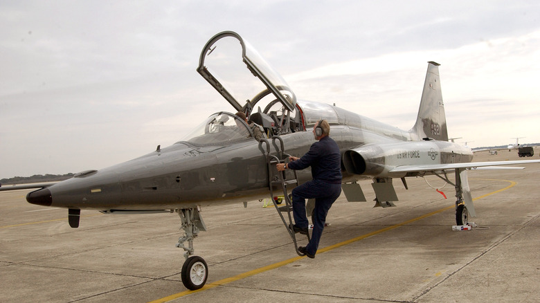 A pilot boards a T-38 jet