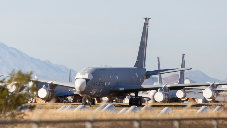 Front view of mothballed KC-135 tanker parked in USAF boneyard.