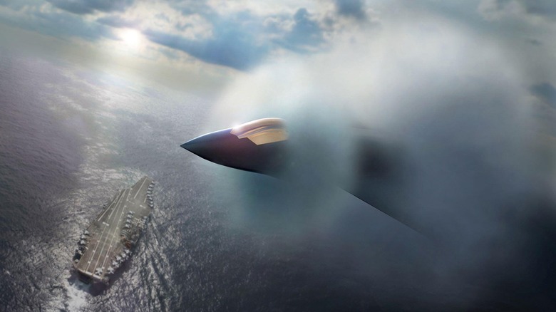 An early artist's rendering of what the Boeing F/A-XX might look like, flying over an aircraft carrier