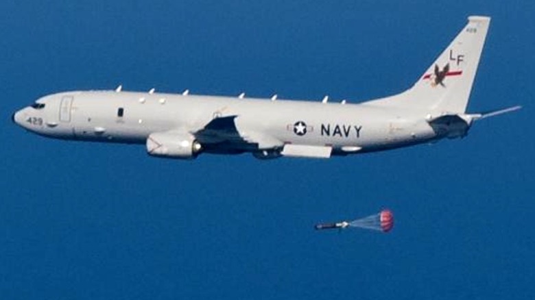 A Boeing P-8A Poseidon of VP-16 deploying a Mark 46 torpedo
