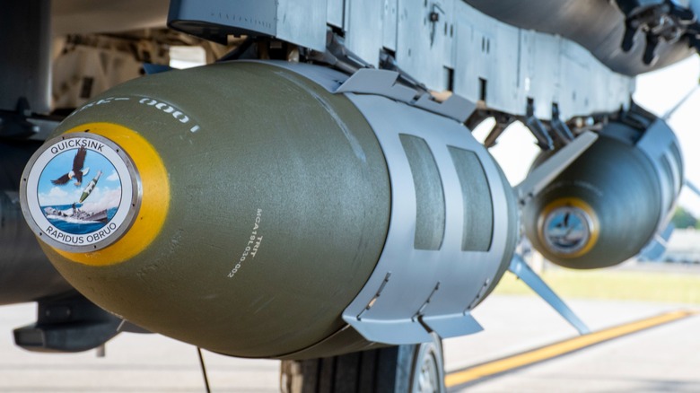 2,000-pound GBU-31 JDAM QUICKSILVER Bombs carried by an F-15E Strike Eagle