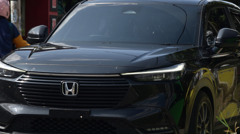 Car with its daytime running lights on