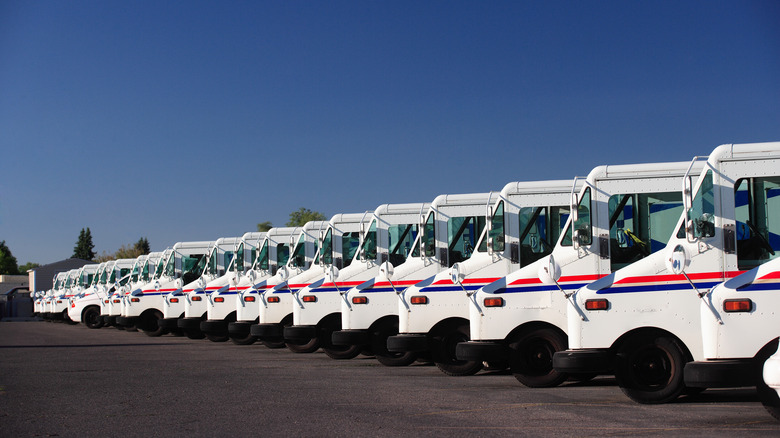 Old USPS delivery vehicles parked