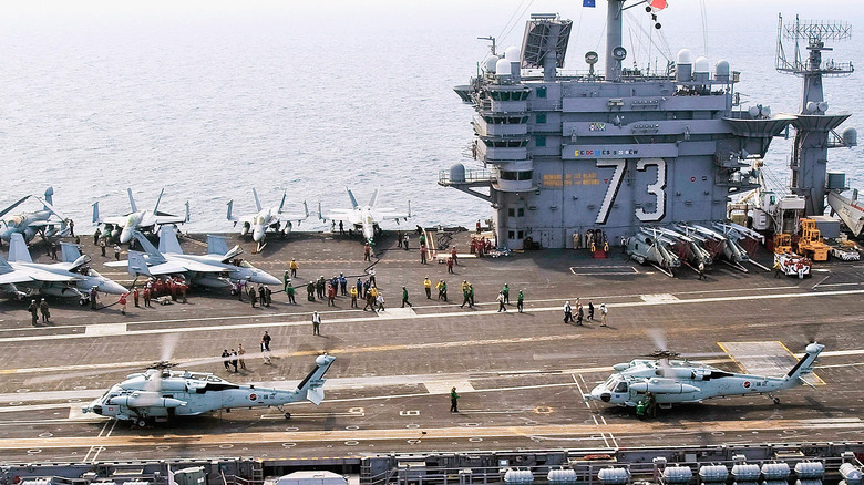 Several aircrafton the deck of USS George Washington.
