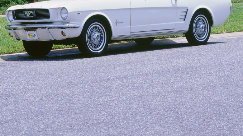 Side shot of a white 1965 Ford Mustang Convertible