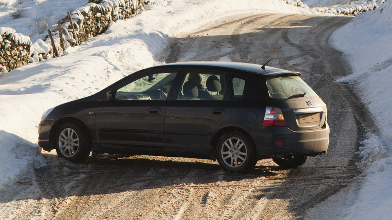 Car that has skidded and crashed on an icy road