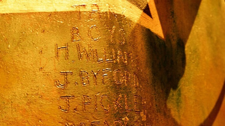 Names carved in Mephisto tank body
