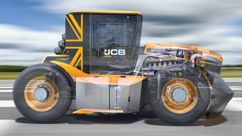 Side view of the JCB Fastrac Two tractor with an overlay showing its internals