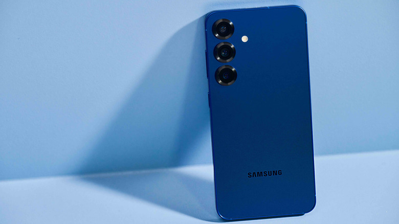 Samsung Galaxy S25+ posted on blue background