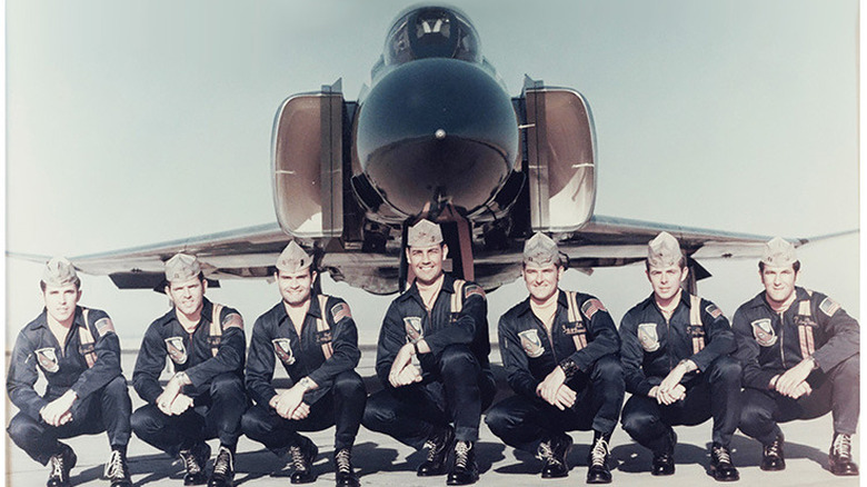 Blue Angels team photo in front of F-4 Phantom II