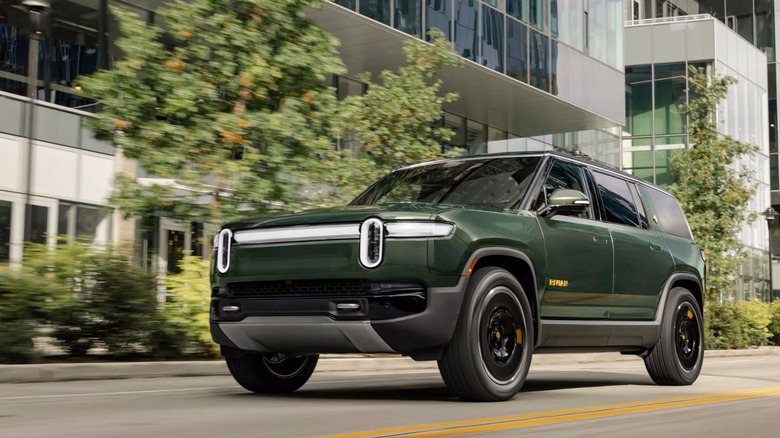 Rivian R1S driving on urban streets