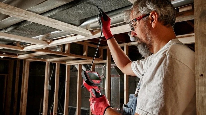 Person using inspection camera