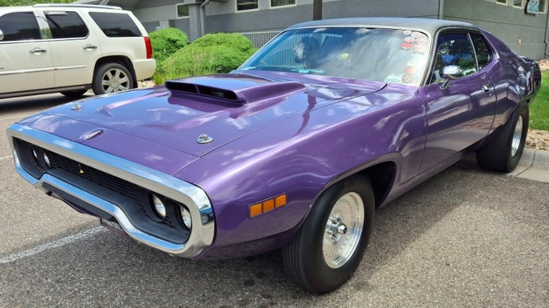 Purple 1971 Plymouth Road Runner in a parking lot