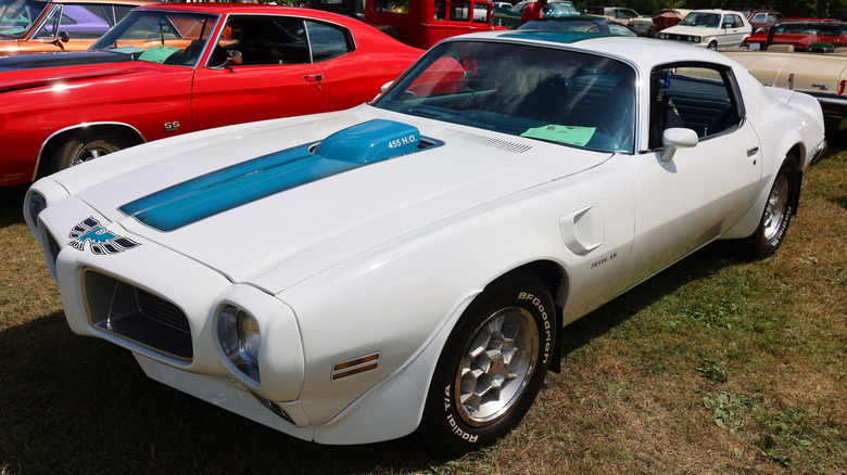 Blue and white 1971 Pontiac Firebird Trans Am parked at a car show