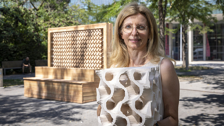 Researcher Milena Stavric displays 3D-printed cooling cube.