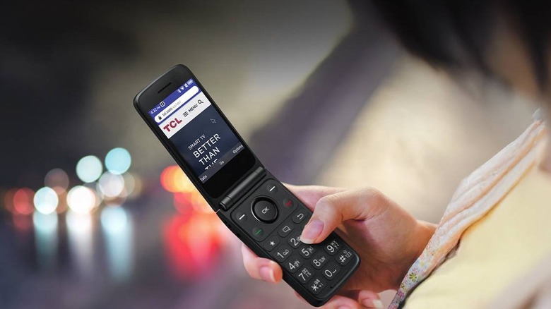 A TCL Flip 4 in a woman's hand.