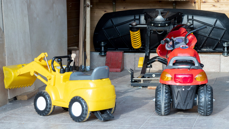 kids vehicles in garage