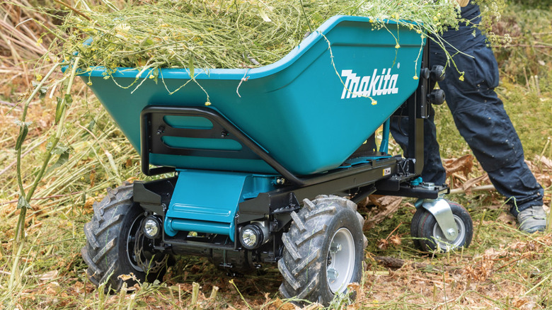 Makita 36V motorized dump bucket hauling yard waste