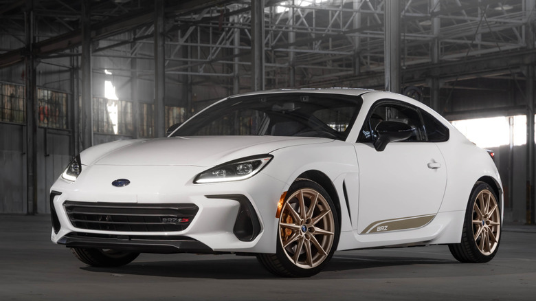 Front 3/4 view of Subaru BRZ ZC15 parked inside a hangar