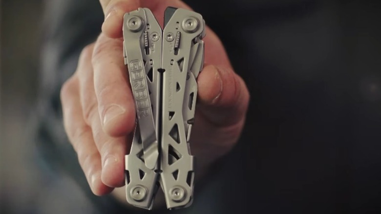 Man holding Gerber Suspension NXT