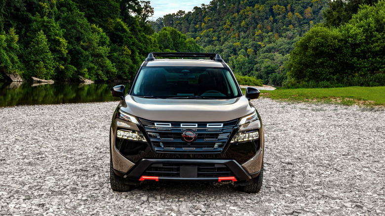 A front view of a 2026 Nissan Rogue Rock Creek parked on a gravel road