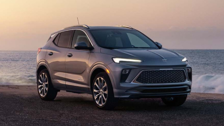 Front 3/4 view of Buick Encore GX on beach by the sea