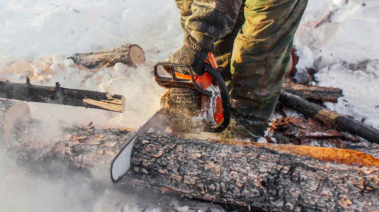 Person using a chainsaw