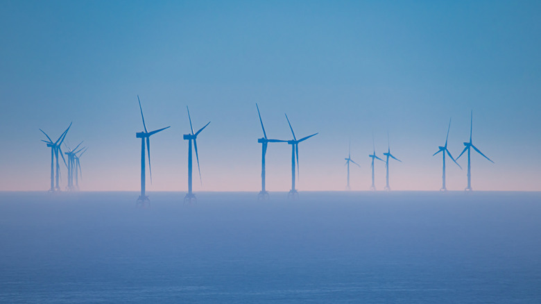 An offshore wind farm at sunrise
