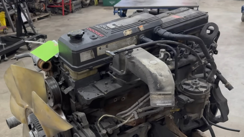 Close up of a Cummins 5.9L ISB 24-valve in a garage