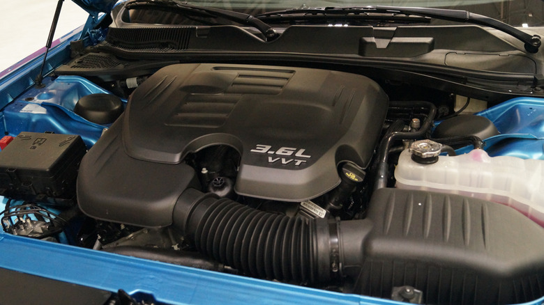 A 3.6L VVT V6 Pentastar engine under the hood of an unidentified model