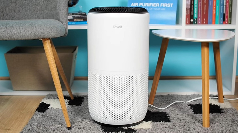 Purifier between chair and table