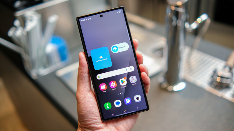 Person showing a Samsung Galaxy Z Fold7 phone with One UI interface