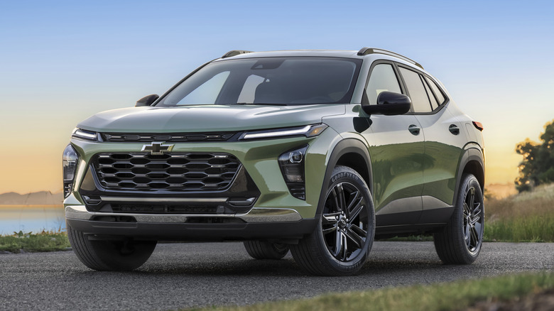 Green Chevrolet Trax parked on a rural road
