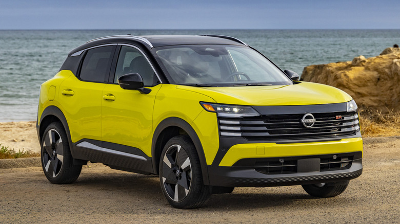 Yellow Nissan Kicks parked at the seaside