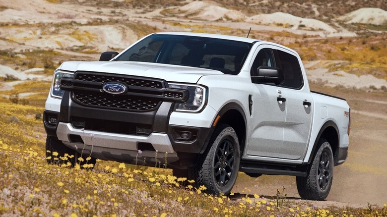 2024 Ford Ranger XLT in white against a scenic backdrop