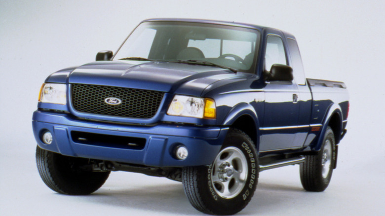 Studio shot of a blue 2001 Ford Ranger