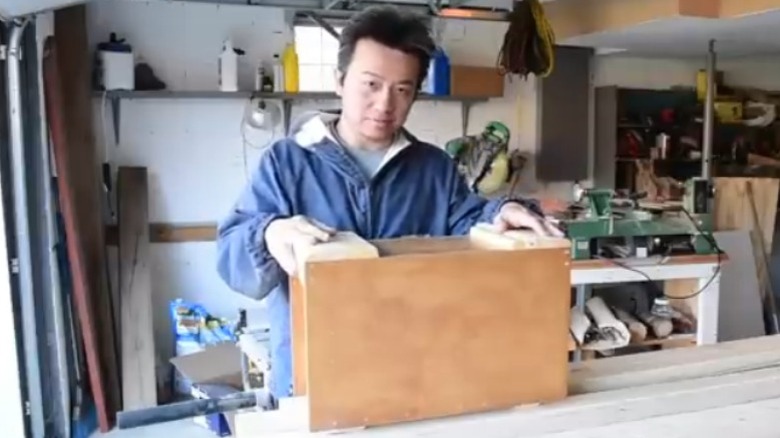 Craftsman showcaseing handmade Japanese tool box