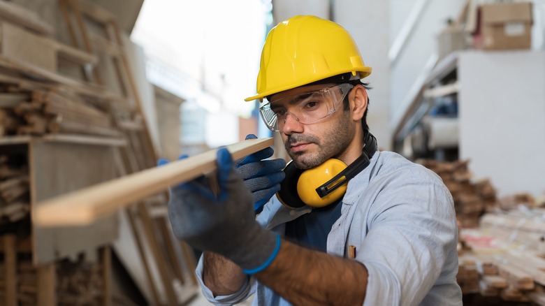 Carpenter checking board straightness
