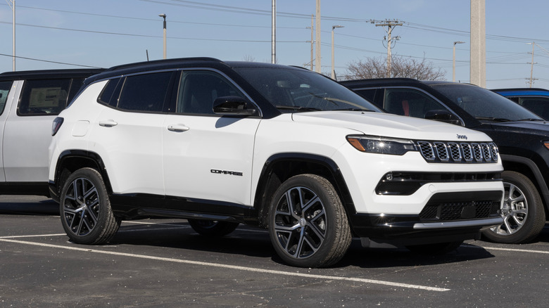 A white Jeep Compass parked