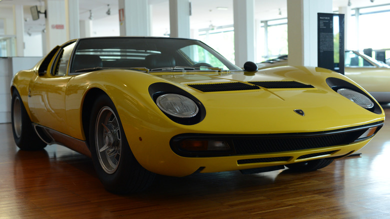 A yellow Lamborghini Miura on display