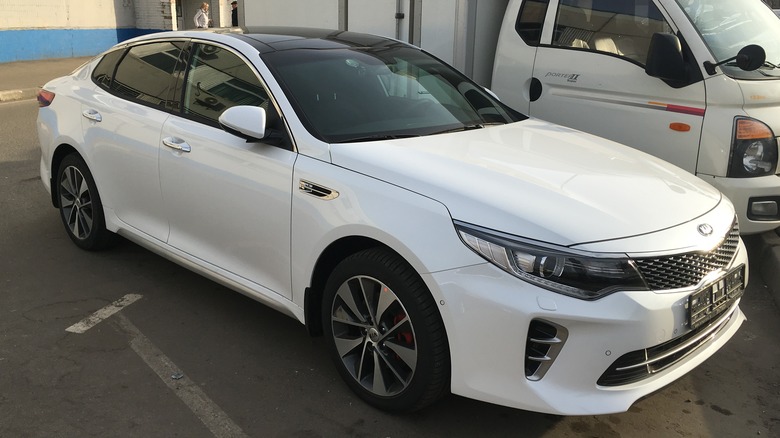 White 2016 Kia Optima parked