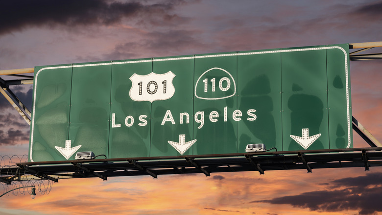 Sign with arrows pointing to 101 and 110 Freeways in Los Angeles