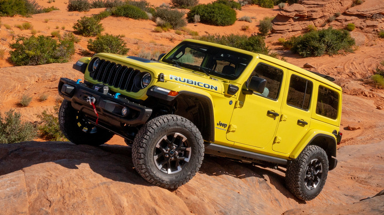 Front 3/4 view of Jeep Wrangler on slickrock in desert setting