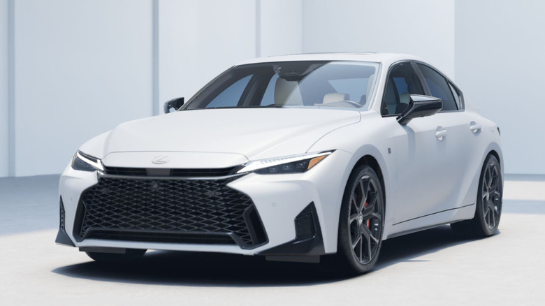 Front 3/4 view of Lexus IS in studio setting