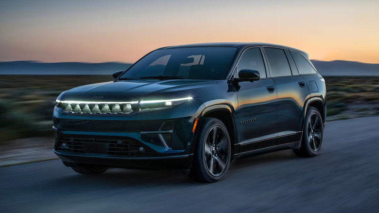 A front end/side shot of a blue Jeep Wagoneer S