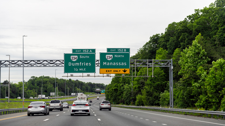Rear view of cars traveling on American Interstate highway.