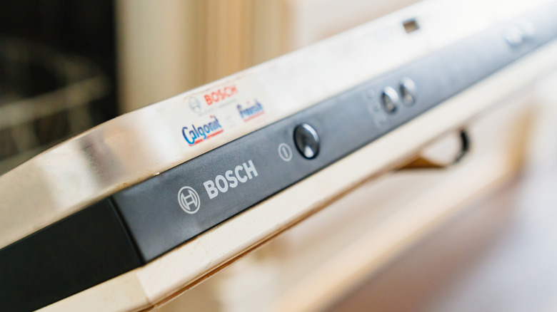 A close-up of the door of a Bosch dishwasher