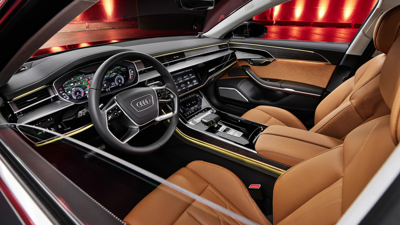 Audi A8 interior with red lighting in background